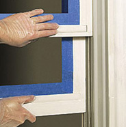 Raise lower sash, drop upper sash.