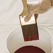 Dip brush into paint.