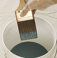 Dip brush into paint.