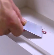 Remove dried on paint with a scraper.