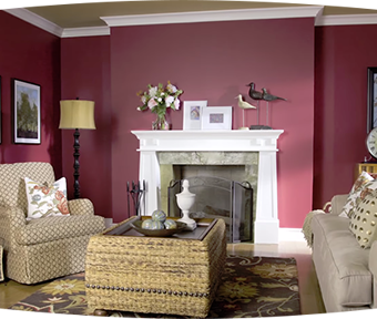 Dark red living room with fire place, lamp, chair, and couch